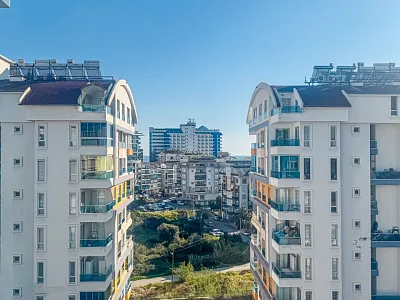 Квартира планировкой 1+1 в районе Тосмур Аланья
