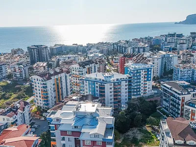 Квартира планировкой 1+1 в районе Тосмур Аланья