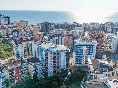 Квартира планировкой 1+1 в районе Тосмур Аланья